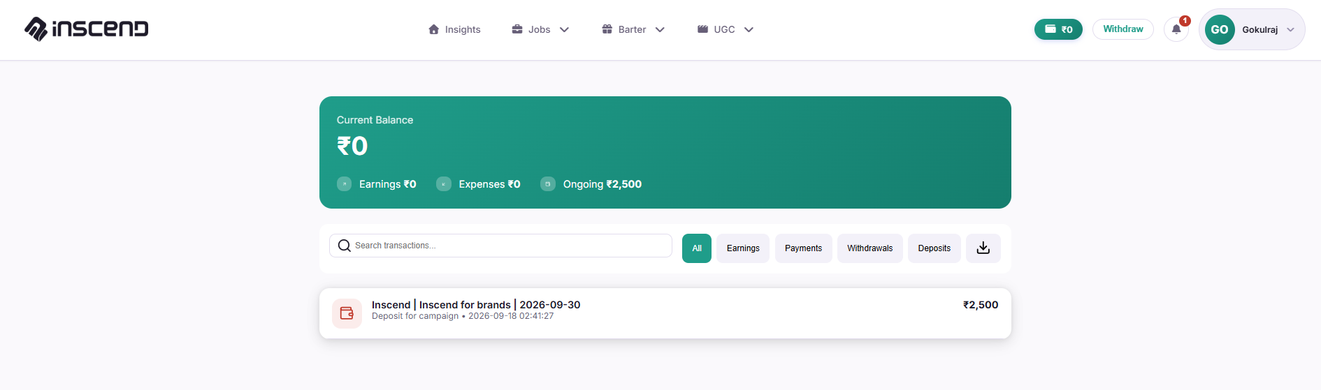 Transactions page with current balance, earnings, expenses, and a deposit transaction